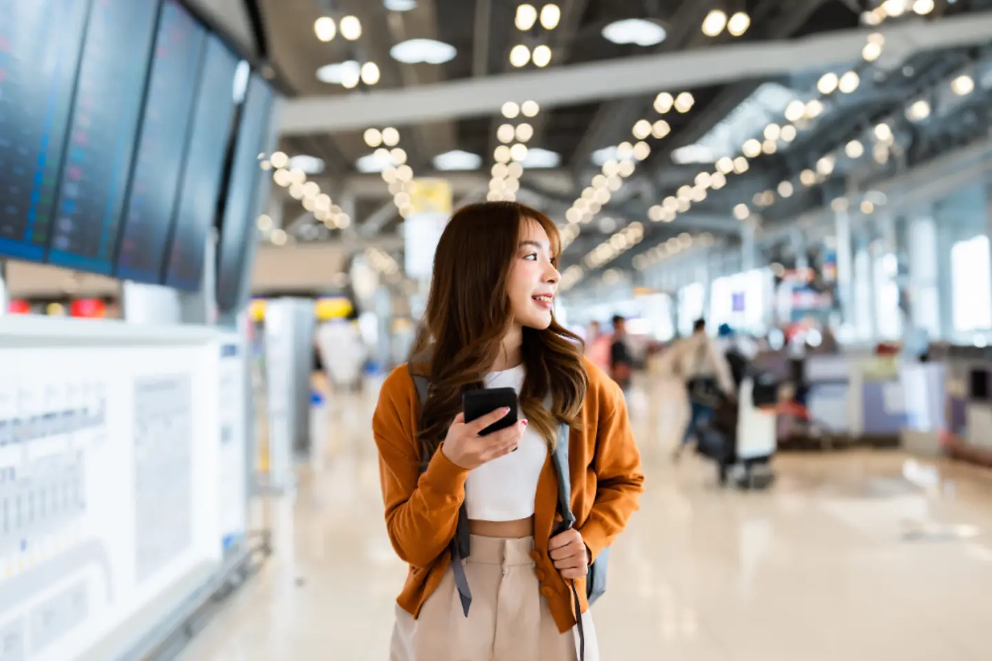 A woman exploring a modern airport