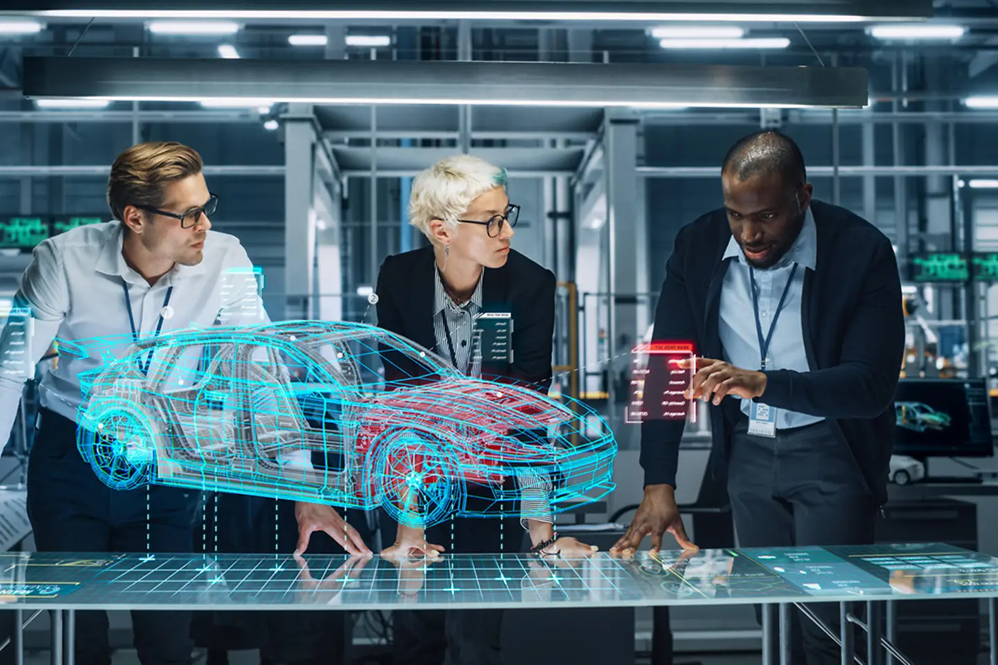 a team of people are working together on a virtual copy of a car floating in midair 