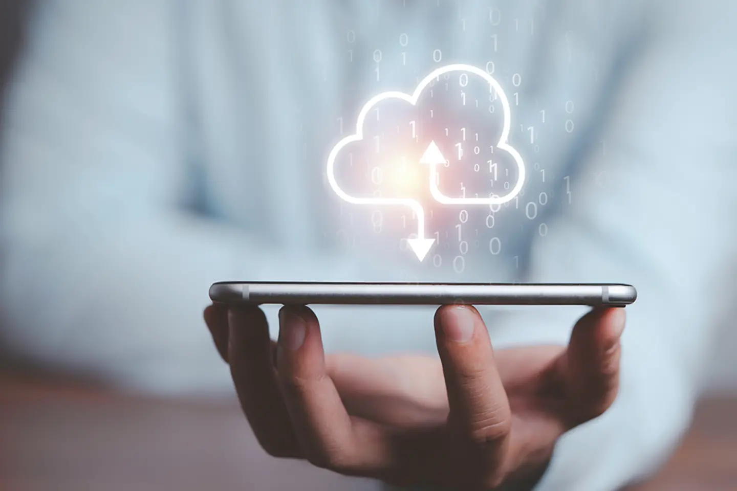 Businessman holding virtual cloud computing on smartphone to transfer data information and upload download application.