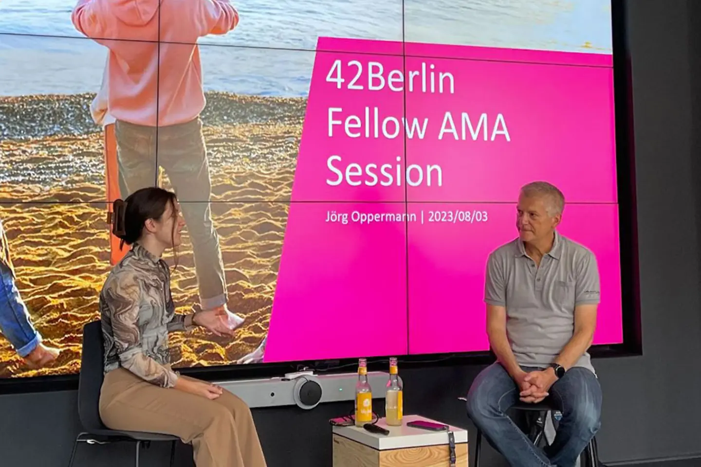 A woman and a man on stage