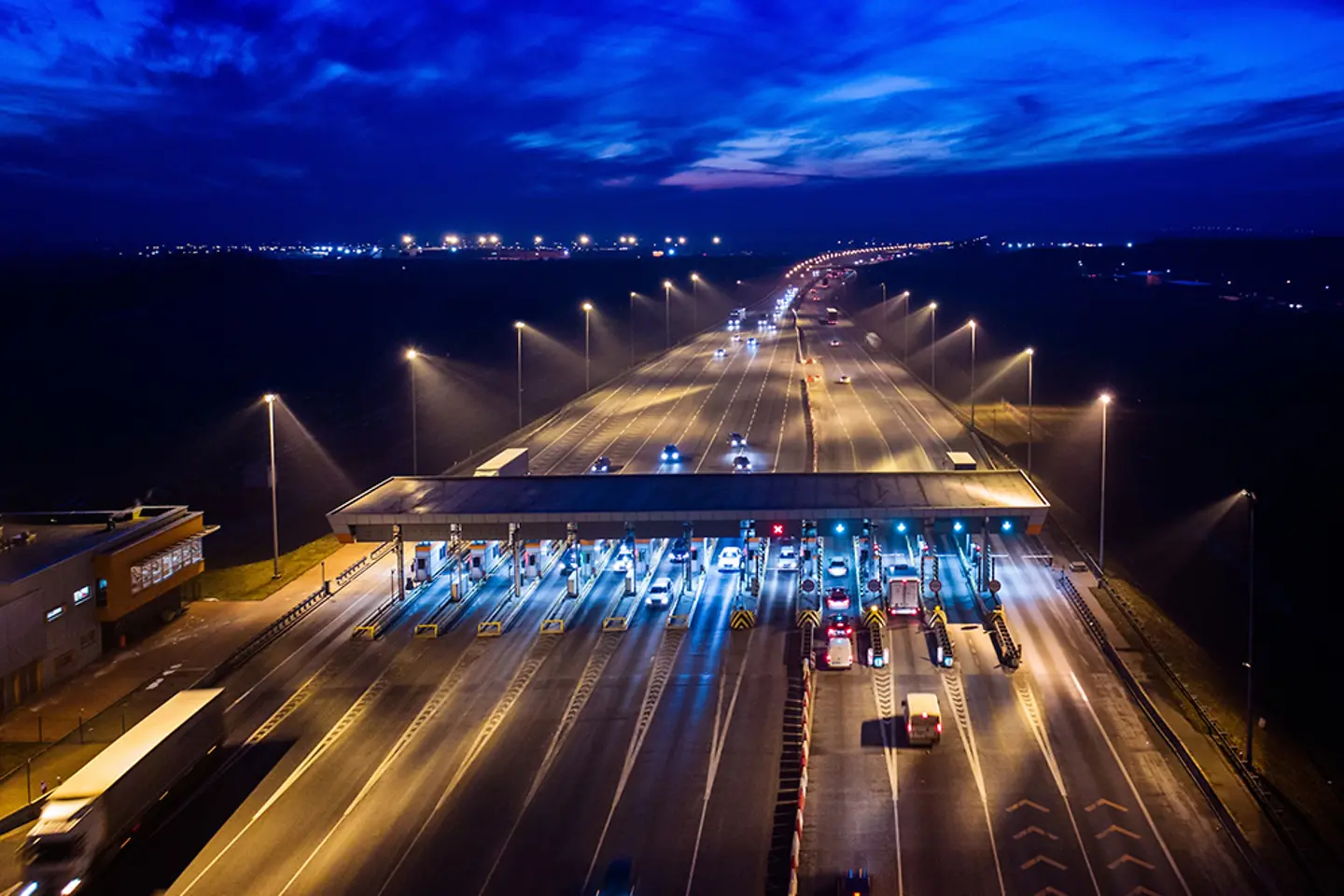 Toll gate at a motorway at night