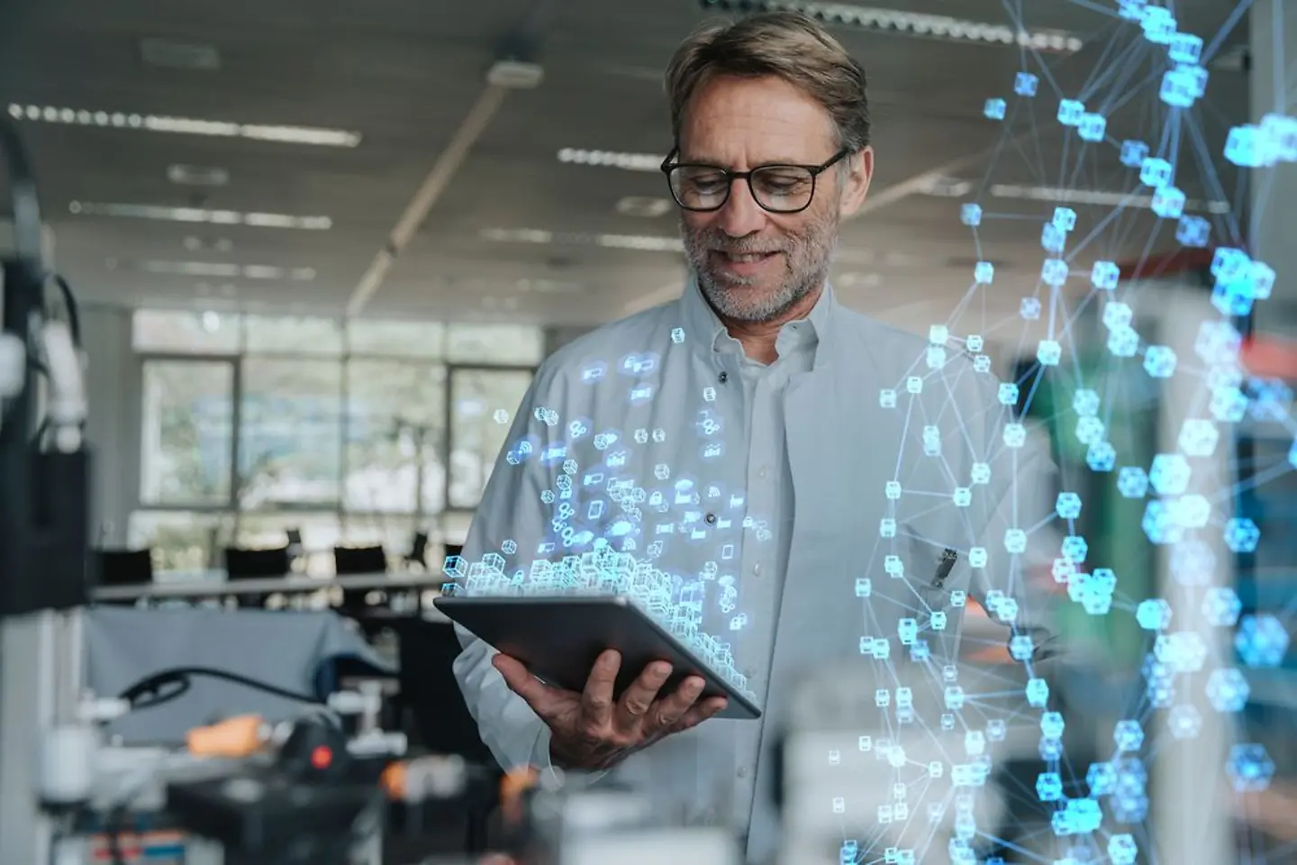 An engineer with a digital tablet working on a project. 