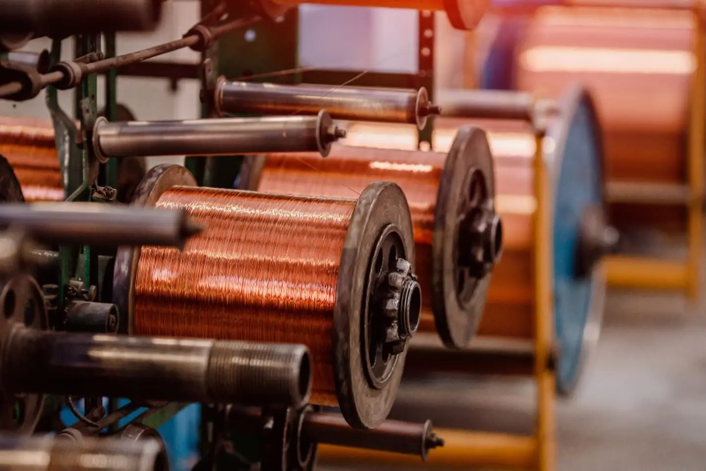 Production of copper wire, bronze cable in reels at factory 