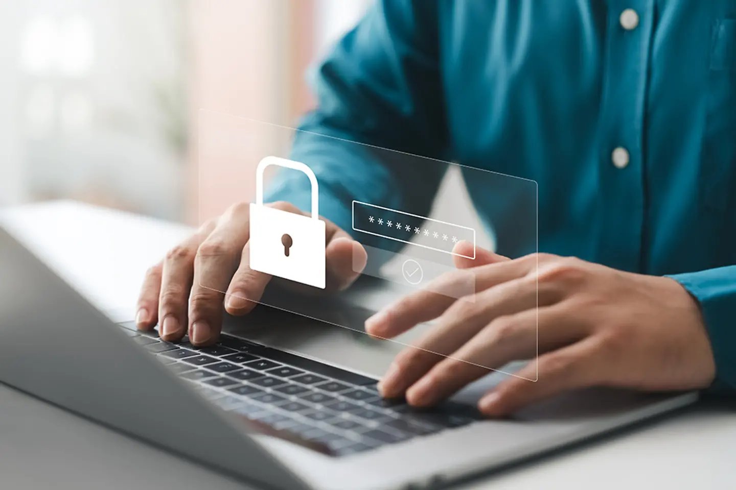 A man uses secure login credentials to access his laptop.