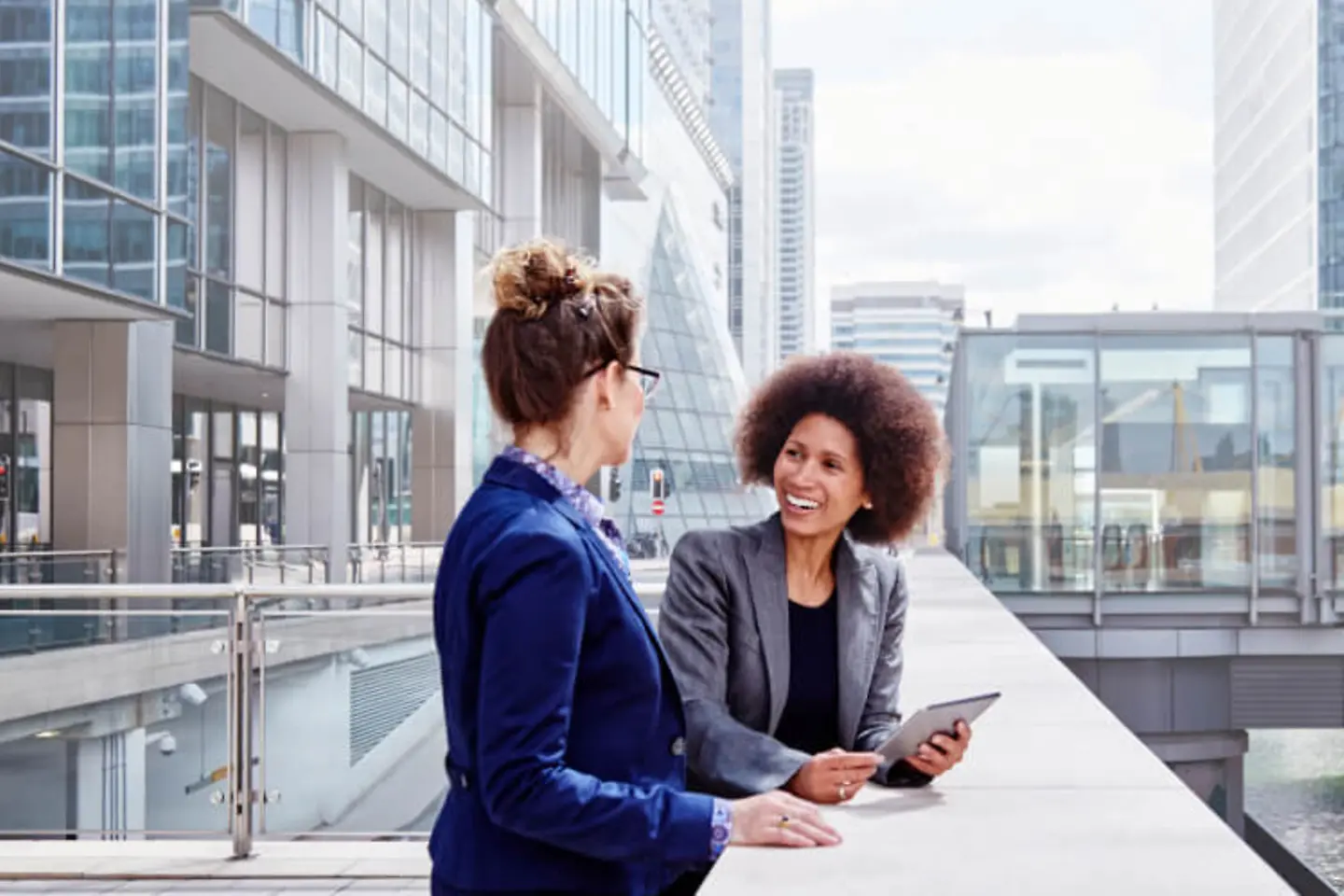 Investment banker giving financial advice to client