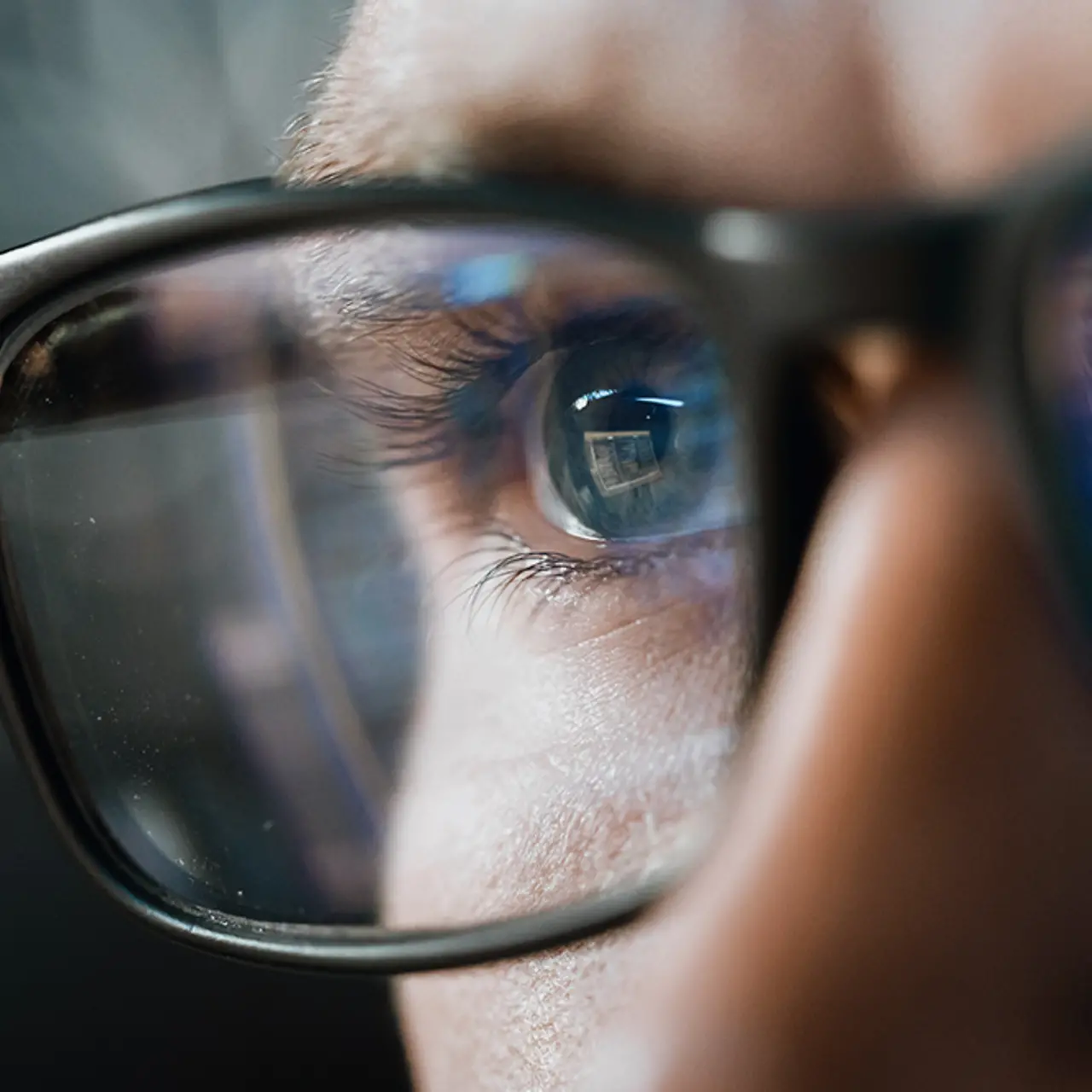 Close-up portrait of software engineer working on AI app