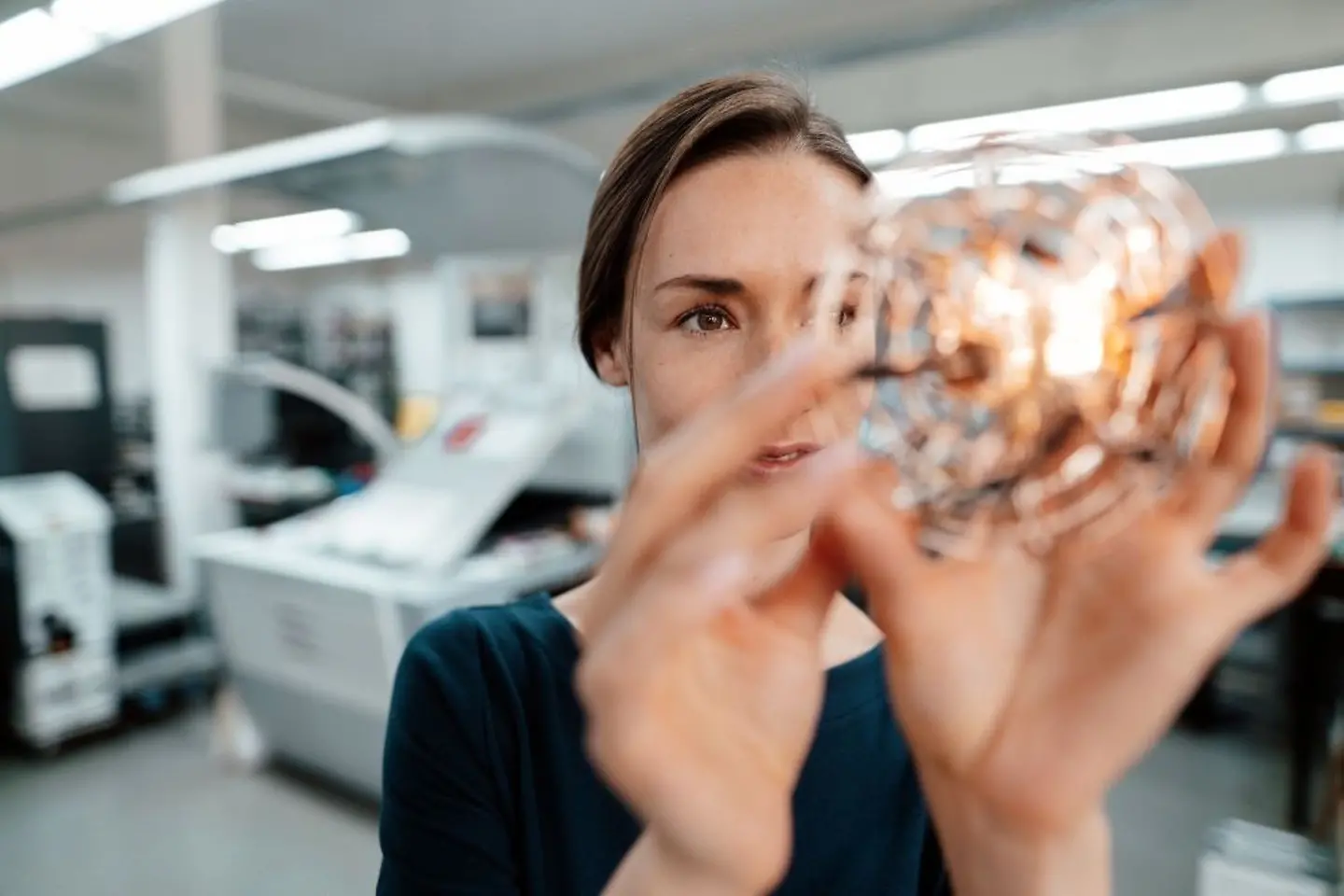 Flowing web of light in magenta, purple, blue on black background.
